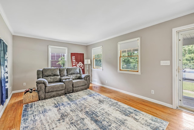 855 Stratford Rd, Stratford, CT 06615 - living room featuring light wood-type flooring and crown molding