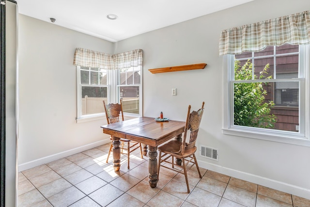 855 Stratford Rd, Stratford, CT 06615 - dining space featuring light tile patterned flooring and baseboards