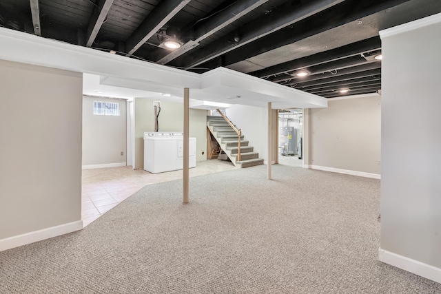 855 Stratford Rd, Stratford, CT 06615 - basement featuring separate washer and dryer, carpet, stairway, water heater, and tile patterned flooring