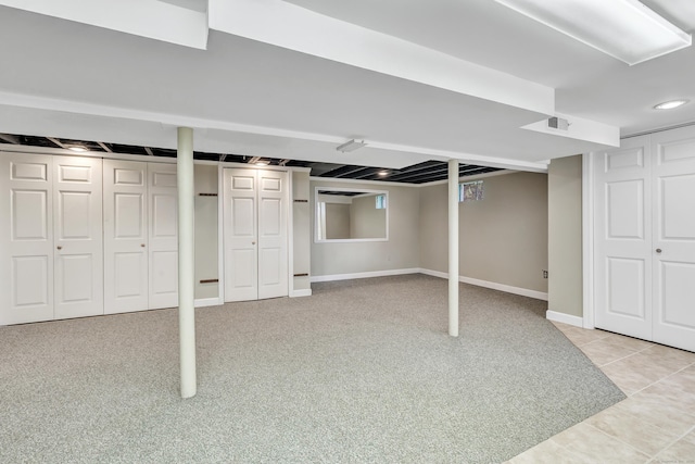 855 Stratford Rd, Stratford, CT 06615 - finished below grade area featuring light tile patterned floors and light carpet