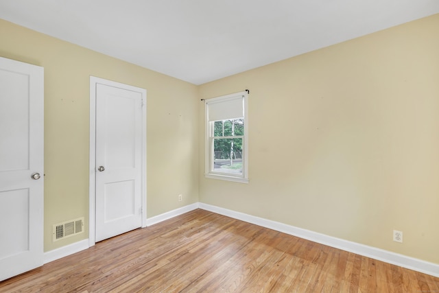 855 Stratford Rd, Stratford, CT 06615 - unfurnished bedroom featuring baseboards and light wood-type flooring