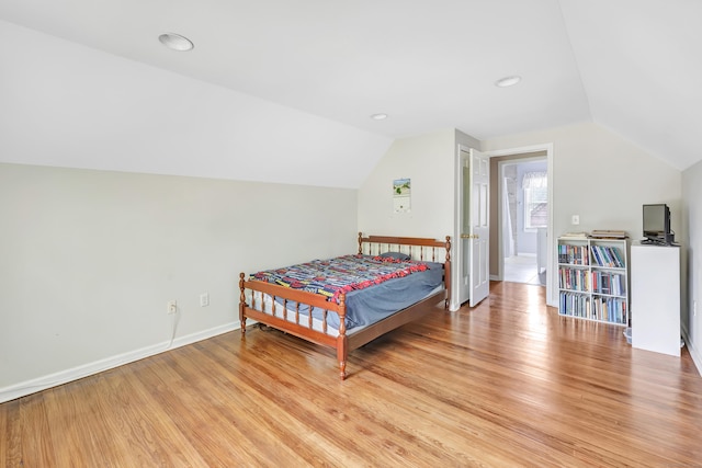 855 Stratford Rd, Stratford, CT 06615 - bedroom with vaulted ceiling and light wood-style flooring