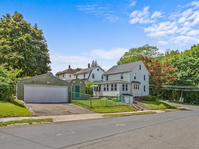 102 Columbus Ave, Meriden, CT 06451 - view of front facade with an outdoor structure and a detached garage