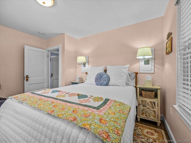 102 Columbus Ave, Meriden, CT 06451 - bedroom featuring baseboards and wood finished floors