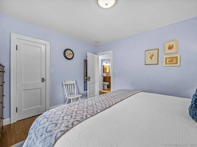 102 Columbus Ave, Meriden, CT 06451 - bedroom with wood finished floors and baseboards
