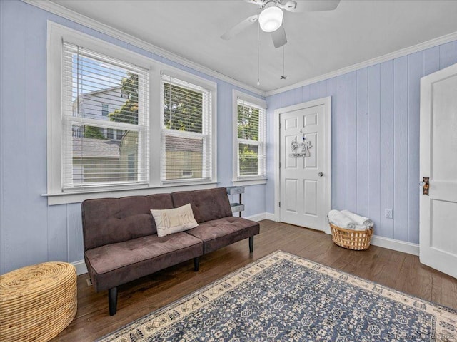 102 Columbus Ave, Meriden, CT 06451 - sitting room featuring wood finished floors, crown molding, baseboards, ceiling fan, and wooden walls