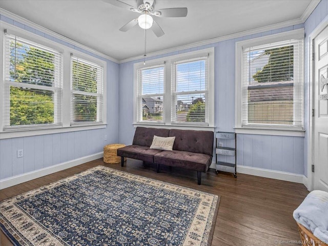 102 Columbus Ave, Meriden, CT 06451 - living area featuring baseboards, ornamental molding, ceiling fan, and wood finished floors