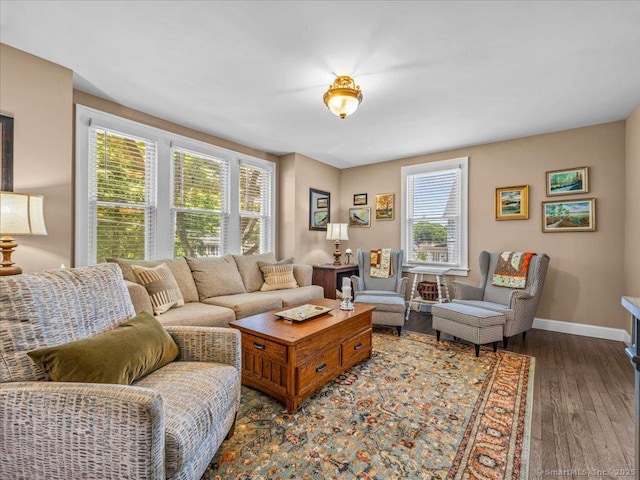 102 Columbus Ave, Meriden, CT 06451 - living room with plenty of natural light, wood finished floors, and baseboards