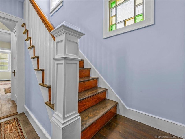 102 Columbus Ave, Meriden, CT 06451 - stairway with healthy amount of natural light, wood finished floors, and baseboards