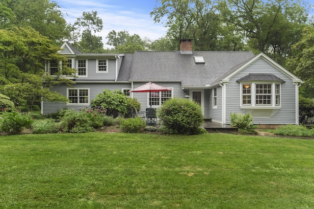 89 Pease Rd, Woodbridge, CT 06525 - view of front of house with a chimney, a front lawn, and roof with shingles