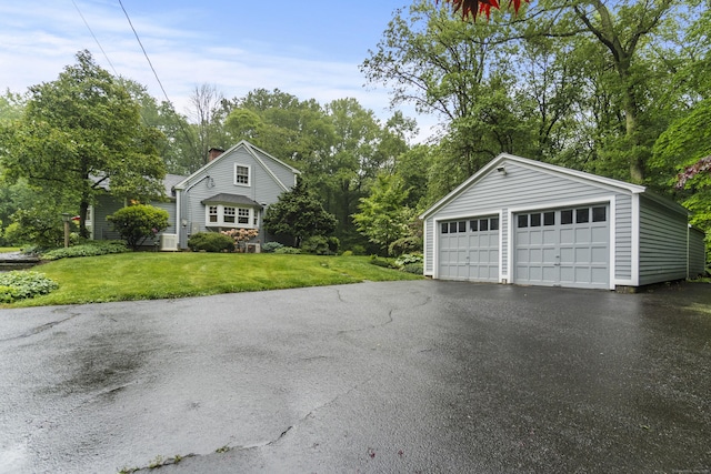 89 Pease Rd, Woodbridge, CT 06525 - detached garage with view of scattered trees