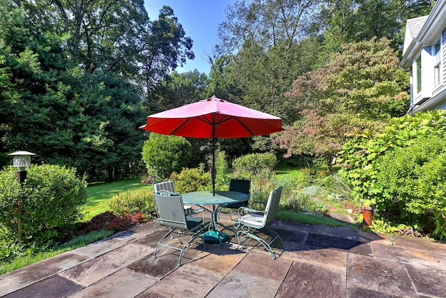 89 Pease Rd, Woodbridge, CT 06525 - view of patio / terrace featuring outdoor dining space and view of scattered trees