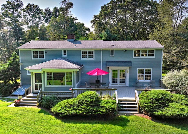 89 Pease Rd, Woodbridge, CT 06525 - rear view of property featuring a deck, a chimney, a yard, and view of wooded area