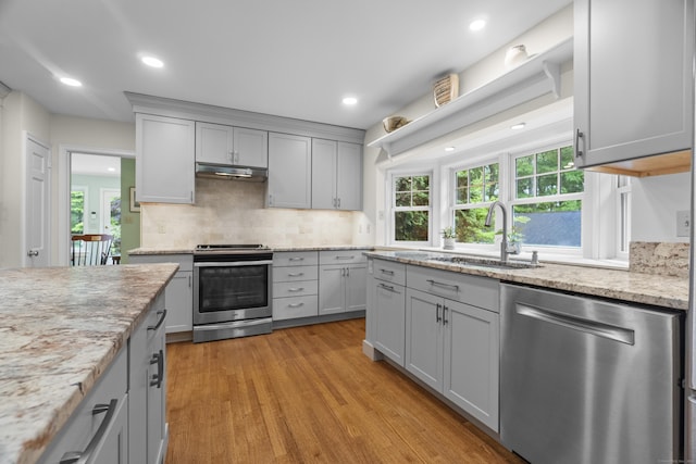 89 Pease Rd, Woodbridge, CT 06525 - kitchen featuring stainless steel appliances, a sink, gray cabinets, decorative backsplash, and recessed lighting