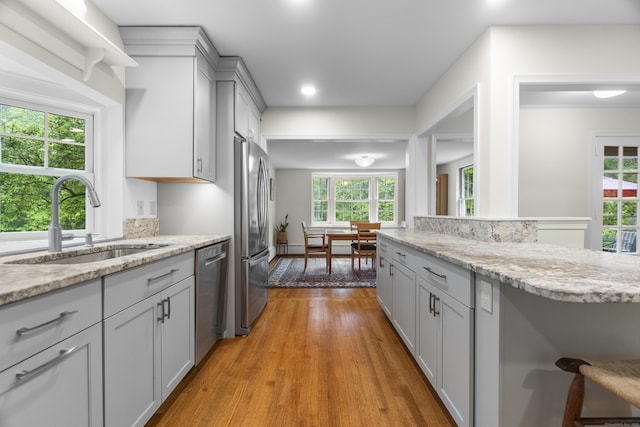 89 Pease Rd, Woodbridge, CT 06525 - kitchen featuring a sink, stainless steel appliances, plenty of natural light, light wood-style flooring, and recessed lighting