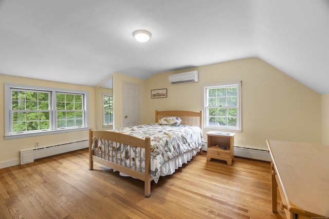 89 Pease Rd, Woodbridge, CT 06525 - bedroom featuring an AC wall unit, baseboard heating, vaulted ceiling, and light wood-style flooring