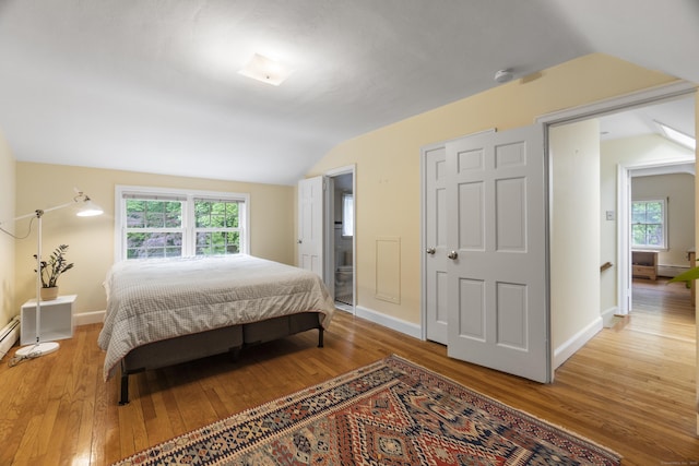 89 Pease Rd, Woodbridge, CT 06525 - bedroom featuring vaulted ceiling, light wood finished floors, multiple windows, and baseboards