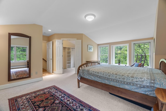 89 Pease Rd, Woodbridge, CT 06525 - bedroom featuring vaulted ceiling, carpet, multiple windows, baseboards, and a baseboard heating unit