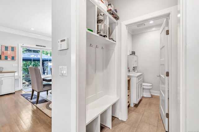 74 Sterling St, Fairfield, CT 06825 - mudroom with ornamental molding, recessed lighting, and baseboards