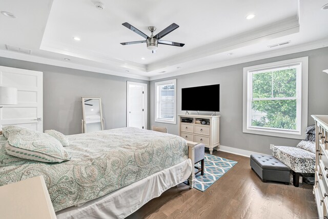 74 Sterling St, Fairfield, CT 06825 - bedroom featuring a tray ceiling, crown molding, dark wood finished floors, baseboards, and recessed lighting