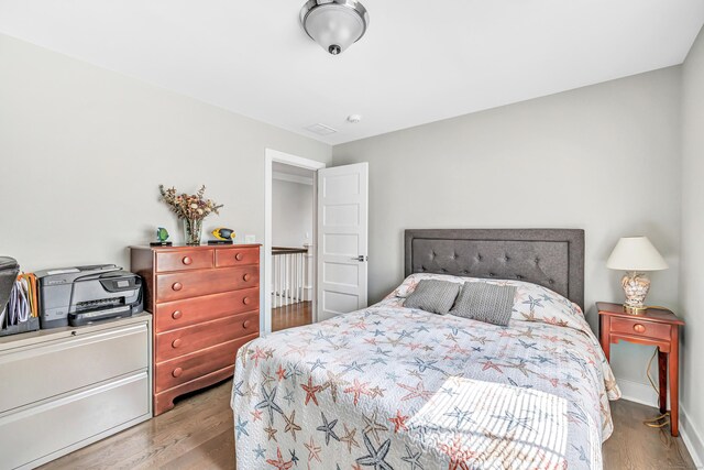 74 Sterling St, Fairfield, CT 06825 - bedroom featuring wood finished floors