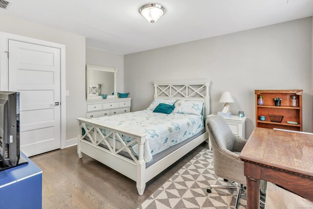 74 Sterling St, Fairfield, CT 06825 - bedroom featuring wood finished floors and a desk