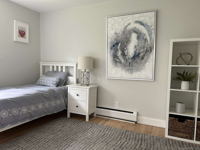 18 Great Meadow Rd, Redding, CT 06896 - bedroom with a baseboard radiator, wood finished floors, and baseboards