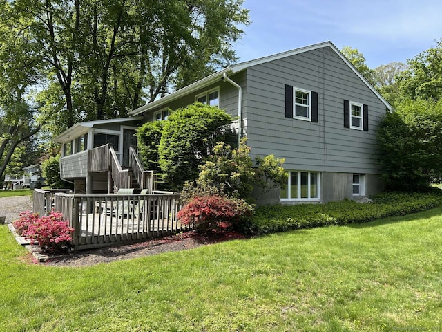 18 Great Meadow Rd, Redding, CT 06896 - view of property exterior featuring a yard, stairs, a deck, and a sunroom