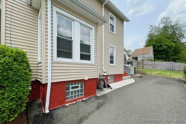 25 Myrtle Ave, Ansonia, CT 06401 - view of property exterior with a patio area