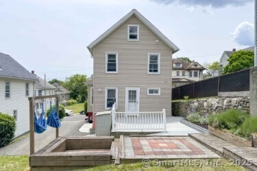 25 Myrtle Ave, Ansonia, CT 06401 - rear view of house featuring a deck