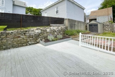 25 Myrtle Ave, Ansonia, CT 06401 - wooden terrace featuring a fenced backyard