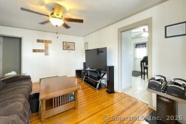 25 Myrtle Ave, Ansonia, CT 06401 - living room featuring a ceiling fan and light wood finished floors