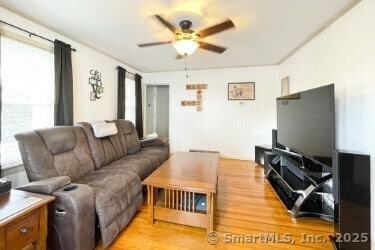 25 Myrtle Ave, Ansonia, CT 06401 - living room with ceiling fan and light wood-style floors