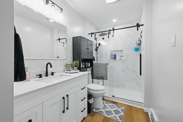 86 Chambers St, Waterbury, CT 06708 - full bath featuring toilet, a marble finish shower, vanity, and wood finished floors