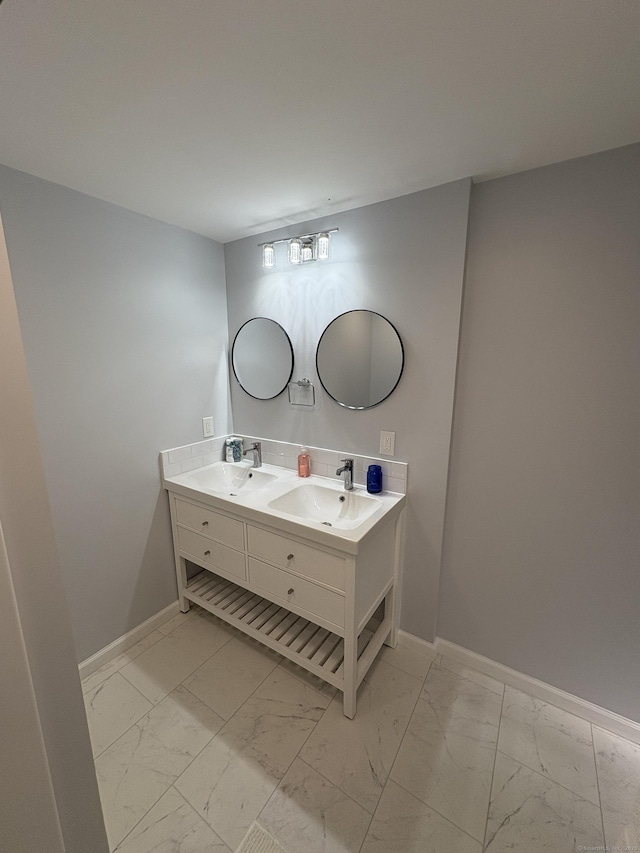 45 Twin Oaks Ln, Danbury, CT 06810 - bathroom with marble finish flooring, double vanity, and baseboards