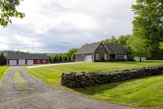 116 Case St, Canton, CT 06019 - ranch-style home with driveway, an outbuilding, a detached garage, and a front yard