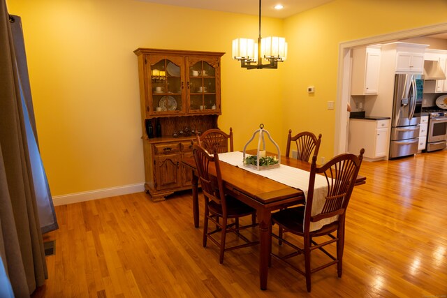 116 Case St, Canton, CT 06019 - dining room with a chandelier, light wood finished floors, baseboards, and recessed lighting