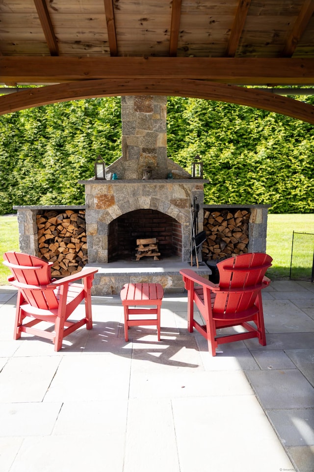 116 Case St, Canton, CT 06019 - view of patio featuring an outdoor stone fireplace