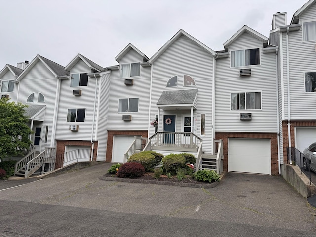 925 Oronoke Rd Unit 26F, Waterbury, CT 06708 - multi unit property featuring a garage, brick siding, and driveway