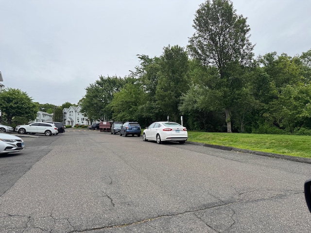 925 Oronoke Rd Unit 26F, Waterbury, CT 06708 - view of asphalt road with curbs