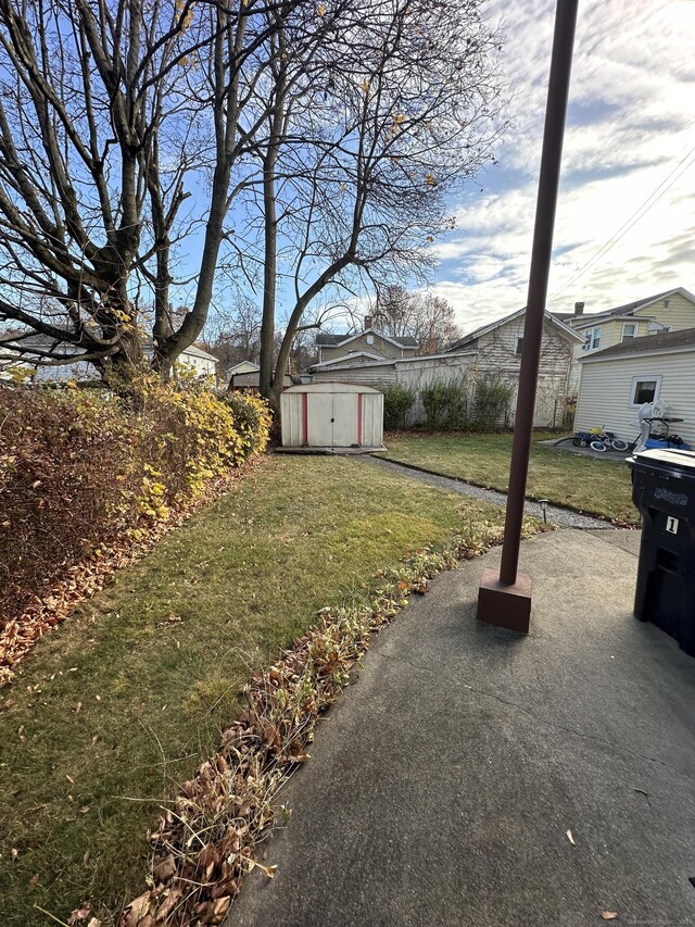 18 New St, Ansonia, CT 06401 - view of grassy yard featuring a patio area