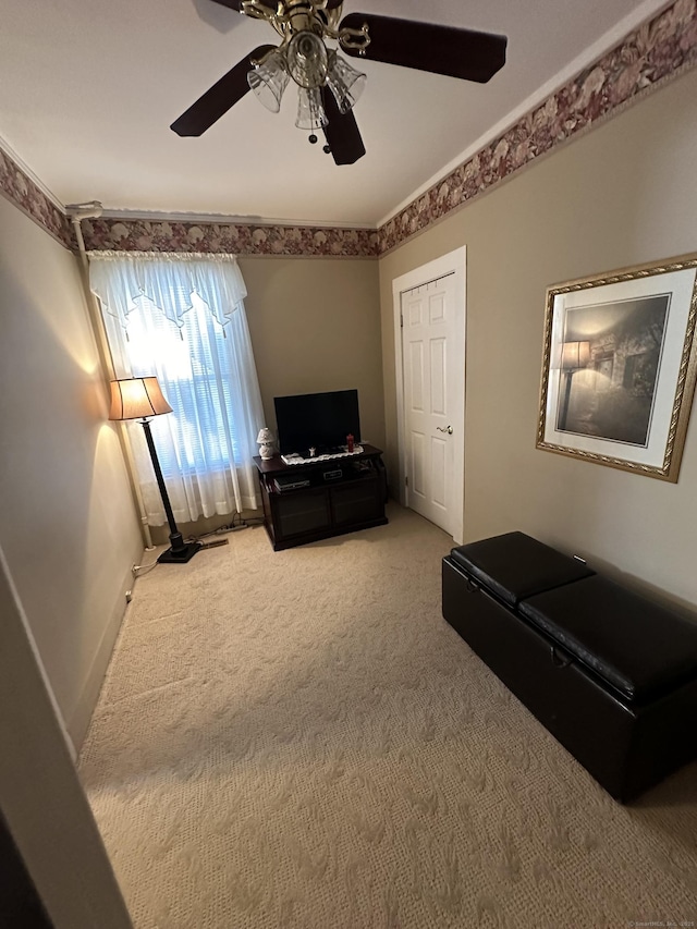 18 New St, Ansonia, CT 06401 - sitting room with light colored carpet, a ceiling fan, and baseboards