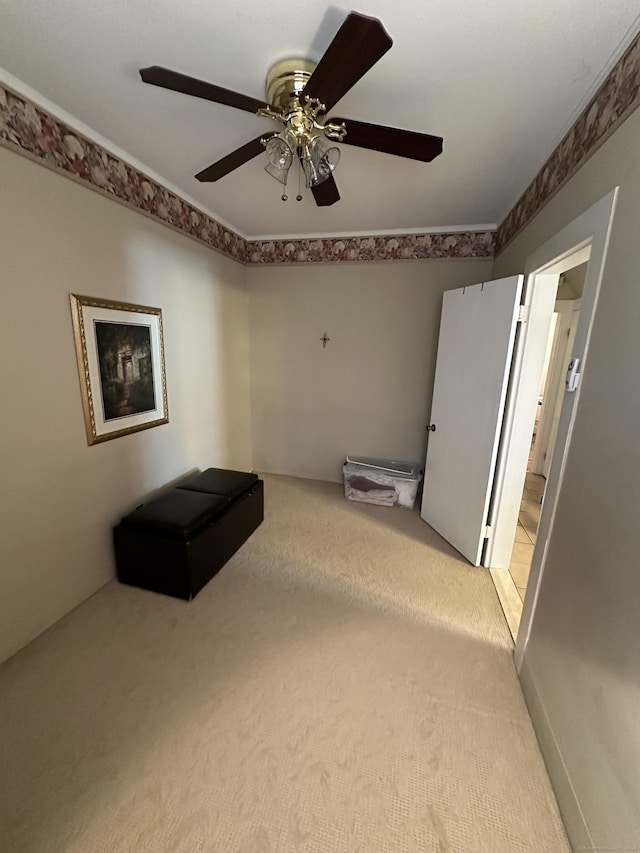 18 New St, Ansonia, CT 06401 - spare room featuring light colored carpet and a ceiling fan