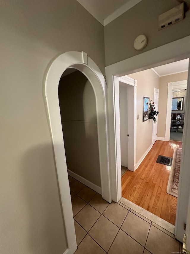 18 New St, Ansonia, CT 06401 - corridor with ornamental molding, light tile patterned flooring, and baseboards
