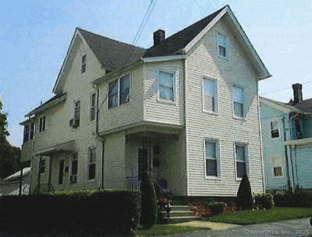 18 New St, Ansonia, CT 06401 - view of front of home featuring a chimney