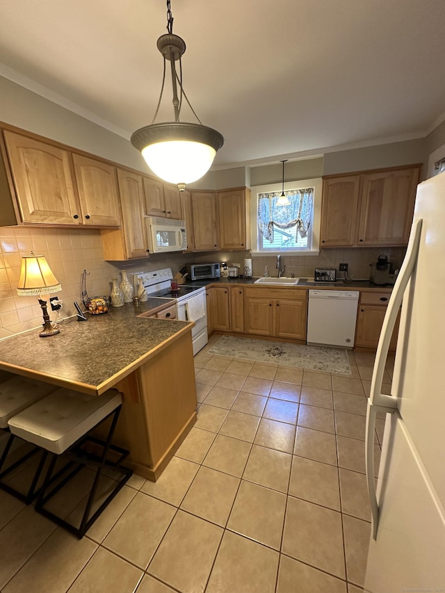 18 New St, Ansonia, CT 06401 - kitchen with white appliances, a sink, light tile patterned flooring, a peninsula, and tasteful backsplash