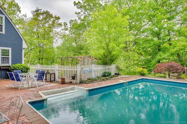 286 Limestone Rd, Ridgefield, CT 06877 - view of swimming pool featuring a patio area, a pergola, and view of scattered trees
