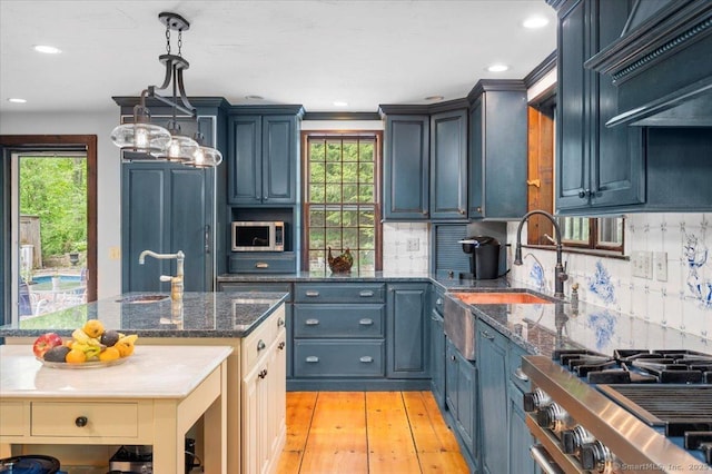 286 Limestone Rd, Ridgefield, CT 06877 - kitchen featuring appliances with stainless steel finishes, healthy amount of natural light, decorative backsplash, a sink, and recessed lighting