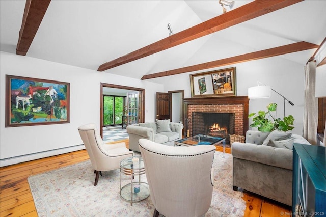 286 Limestone Rd, Ridgefield, CT 06877 - living room with wood-type flooring, a fireplace, and baseboard heating