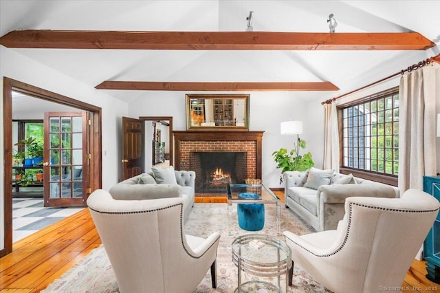 286 Limestone Rd, Ridgefield, CT 06877 - living room featuring a fireplace, plenty of natural light, and light wood finished floors